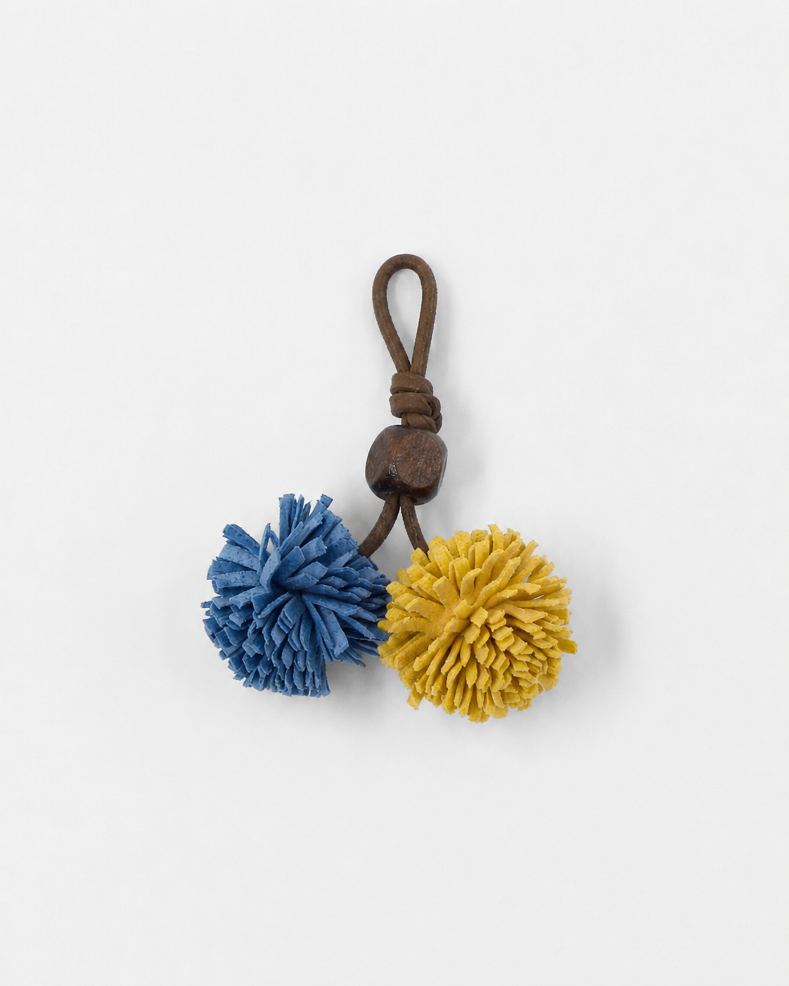Pompom Charm Blauw Oker
