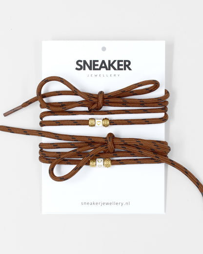 Veters & Bedelset Bruin Goud