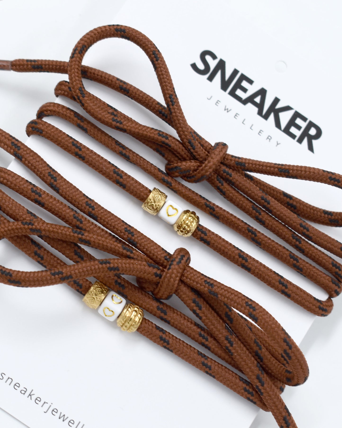 Veters & Bedelset Bruin Goud