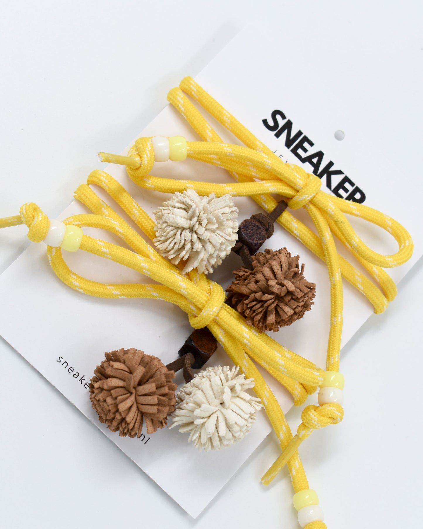 Veters & Bedelset Geel Pompom