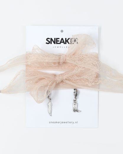 Veters & Bedelset Crème Kant